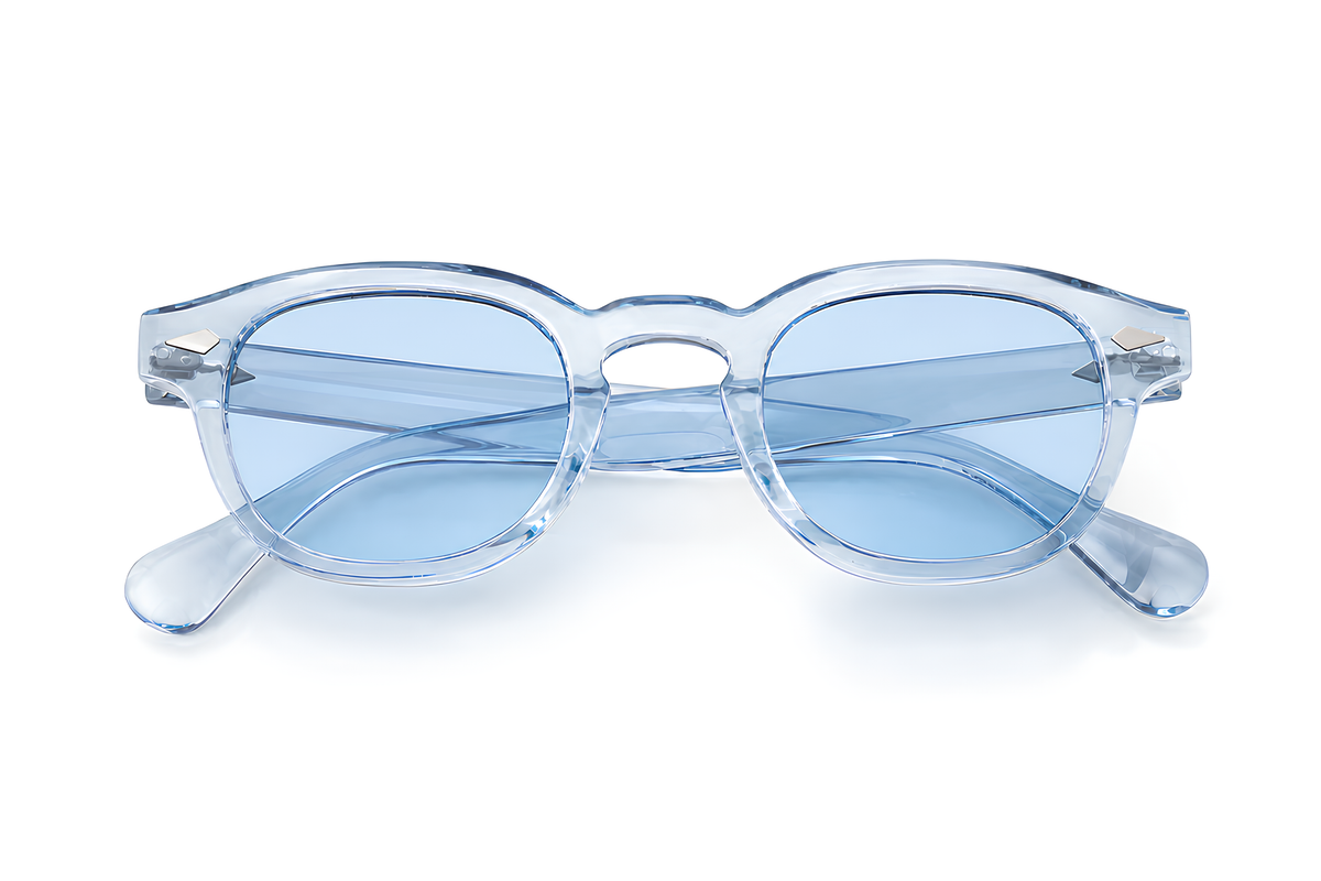 Lunettes de soleil Crystal Blue Sunrise Ibiza, monture cristal bleutée et verres bleus clairs, collection Signature