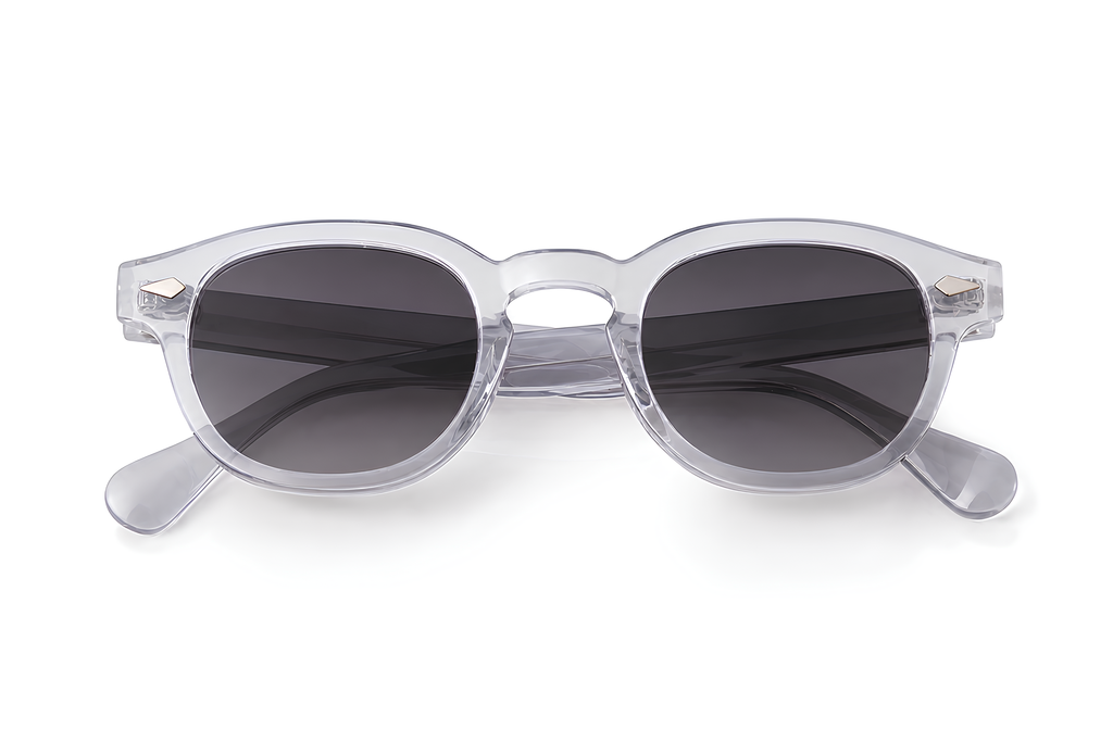 Lunettes de soleil Ushuaïa Sunrise Ibiza, monture cristal transparente et verres gris fumés, collection Icon
